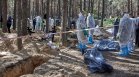 Още два гроба с телата на стотици хора са открити край украинския град Изюм